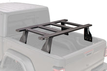 Kit de 2 barres de toit de 1500 mm et 4 transversales pour Ford Ranger 2011-2022, marque Rhino-Rack, installation sur le toit du véhicule.