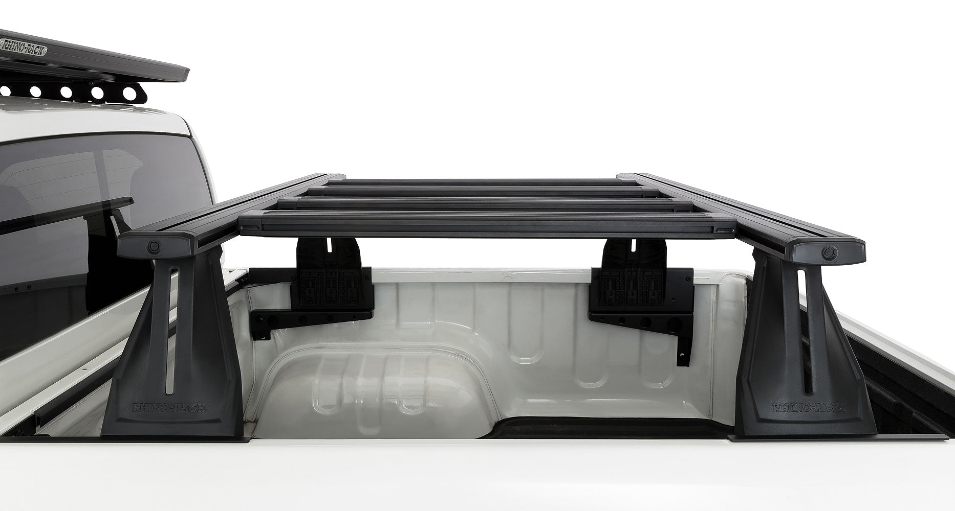 Kit de 2 barres de toit Rhino-Rack 1500 mm avec 4 transversales pour Toyota Hilux Revo 2015+, système Reconn-Deck.