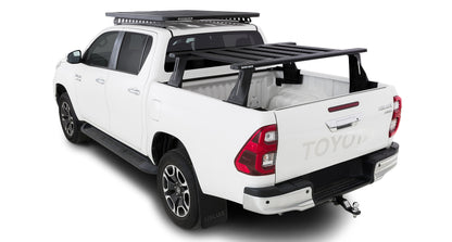Kit de 2 barres de toit RHINO-RACK pour Toyota Hilux Revo 2015+ avec système Reconn-Deck et 6 barres transversales.
