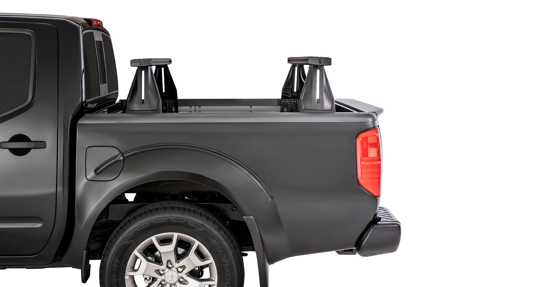 Kit 2 barres de toit Vortex pour Nissan Navara NP300 2015+ avec système Reconn-Deck, marque RHINO-RACK, vue de dessus.