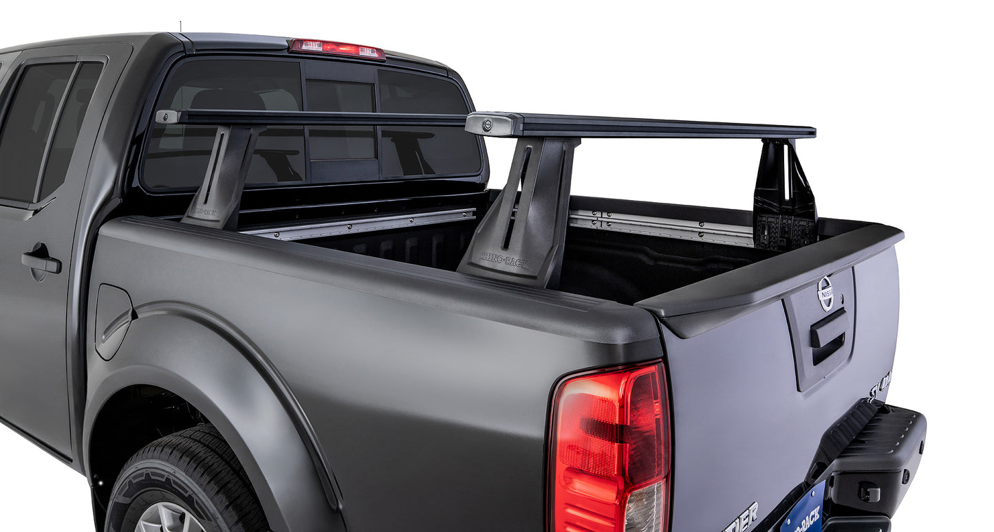 Kit de 2 barres de toit Vortex RHINO-RACK pour Nissan Navara NP300 2015+ avec système Reconn-Deck, barres de benne robustes.