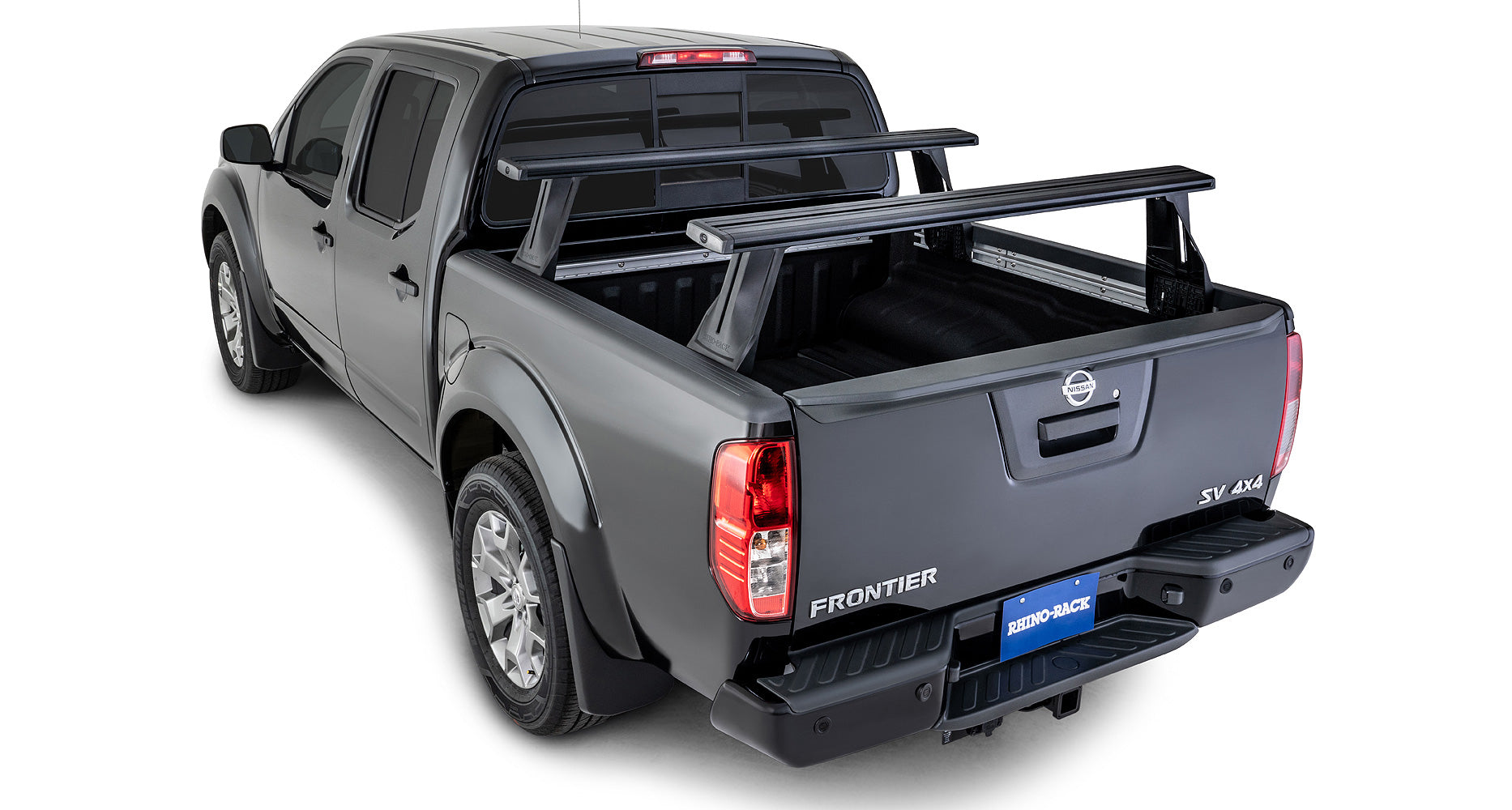 Kit 2 barres de toit Vortex RHINO-RACK pour Nissan Navara NP300 2015+ avec système Reconn-Deck, fixation robuste pour chargement en hauteur.