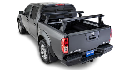 Kit 2 barres de toit Vortex RHINO-RACK pour Nissan Navara NP300 2015+ avec système Reconn-Deck, fixation robuste pour chargement en hauteur.