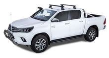 Kit 2 barres de toit noires Heavy Duty RHINO-RACK pour Toyota Hilux Revo 2015+, série 2500, longues de 1250 mm.