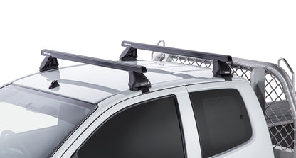 Kit 2 barres de toit Heavy Duty noires de 1375mm pour Isuzu D-Max Gen II TF 2016-2020, marque RHINO-RACK.