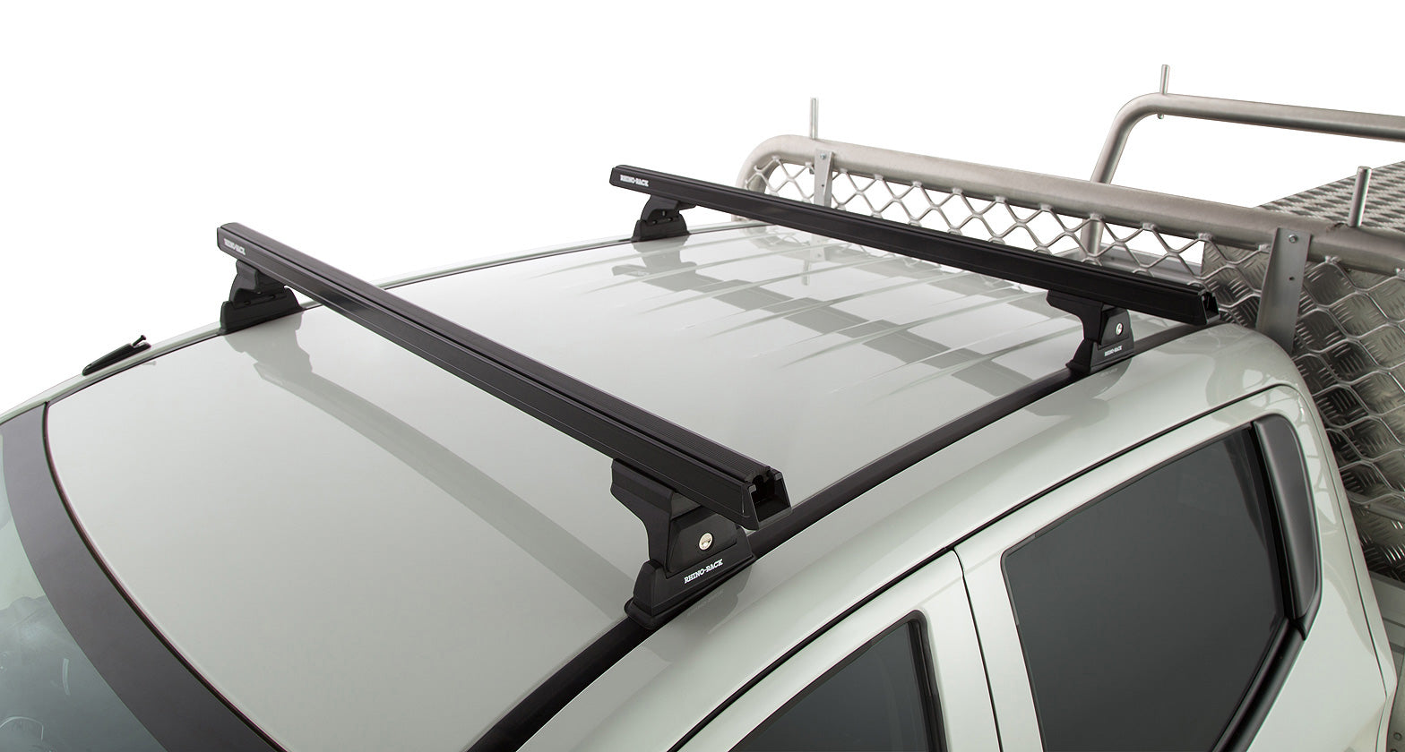 Kit de 2 barres de toit noires Heavy Duty de 1250 mm pour Mitsubishi L200 V génération, marque RHINO-RACK, montage Ditch Mount.