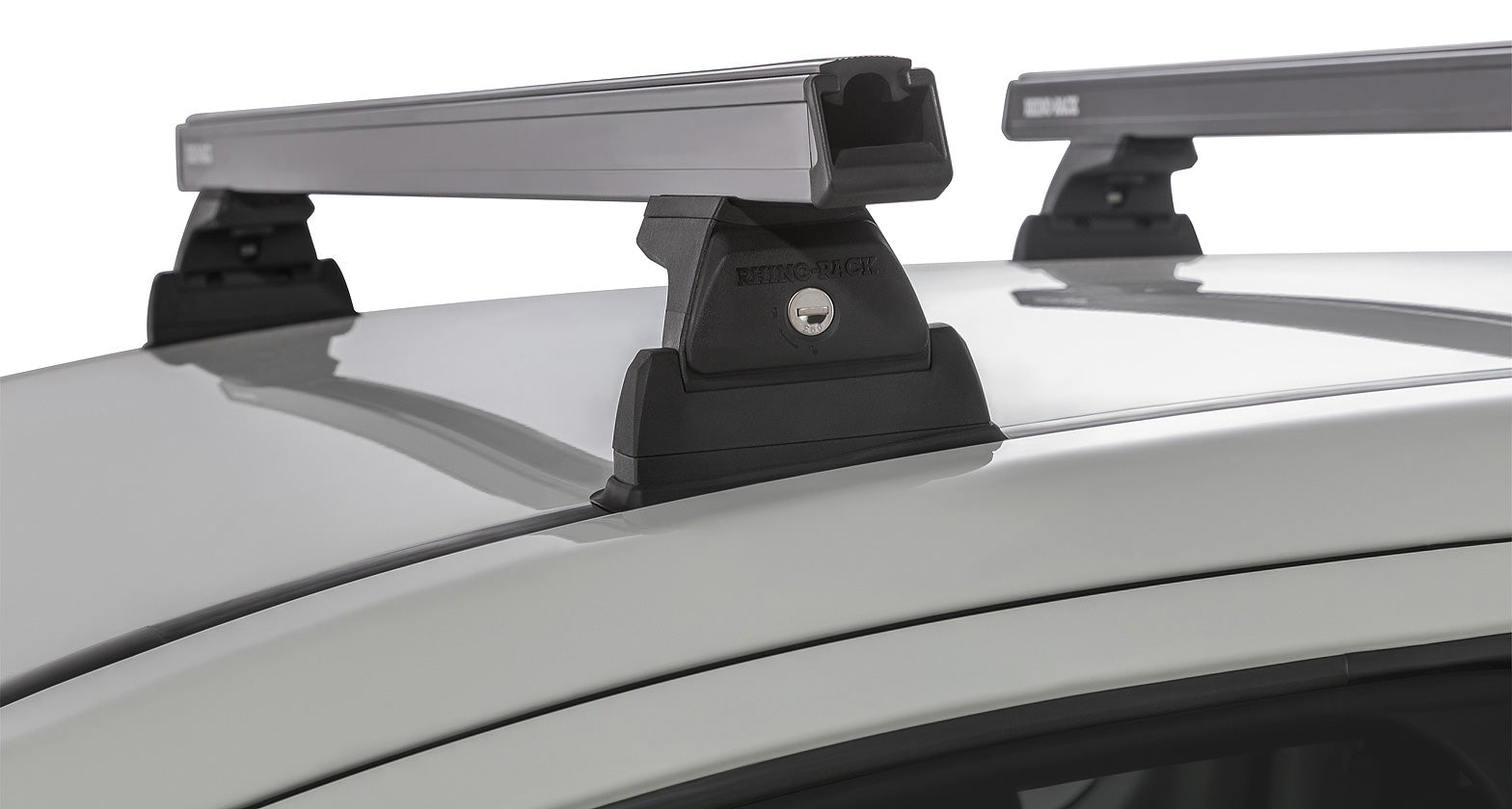 Kit de 2 barres de toit noires Heavy Duty 1250 mm pour Mitsubishi L200 Gen V, fixation Ditch Mount, marque RHINO-RACK.