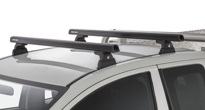 Kit de 2 barres de toit noires Heavy Duty RHINO-RACK pour Mitsubishi L200 V, montage Ditch, longueur 1250 mm, robuste et pratique.