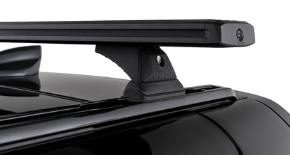 Kit de 2 barres de toit noires RHINO-RACK pour Land Rover Defender II 90 L663 2021+, longue de 1260mm, fixation robuste.