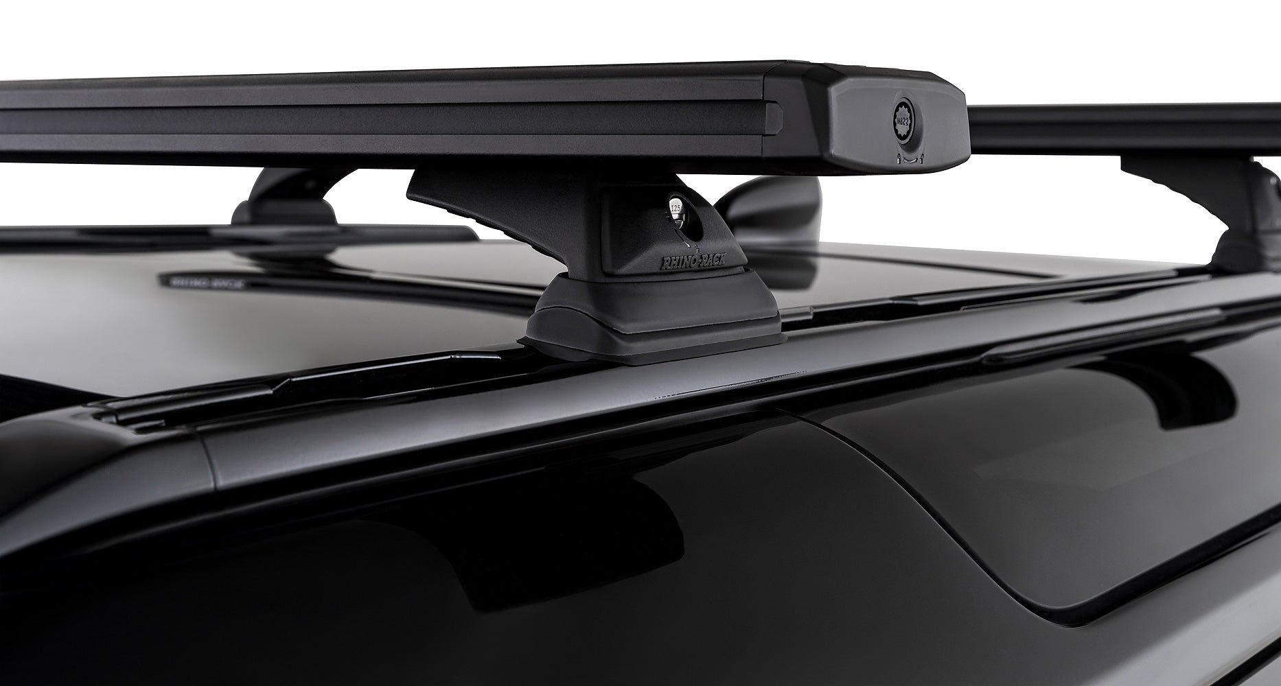 Kit de 2 barres de toit noires RHINO-RACK pour Land Rover Defender II 90 L663 2021+, 1260mm, fixation robuste.