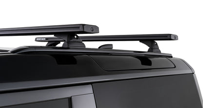 Kit de 2 barres de toit noires RHINO-RACK pour Land Rover Defender II 90 L663 2021+, longueur 1260mm, fixation solide.