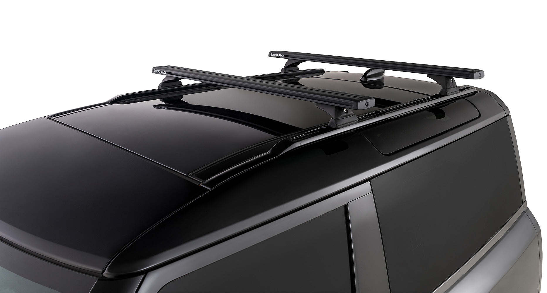 Kit de 2 barres de toit noires RHINO-RACK pour Land Rover Defender II 90 2021+, longueur 1260mm, fixation solide.
