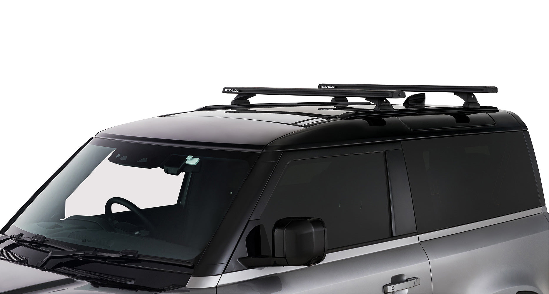 Kit de 2 barres de toit noires de 1260 mm pour Land Rover Defender II 90 2021+ de RHINO-RACK, fixations robustes et design aérodynamique.