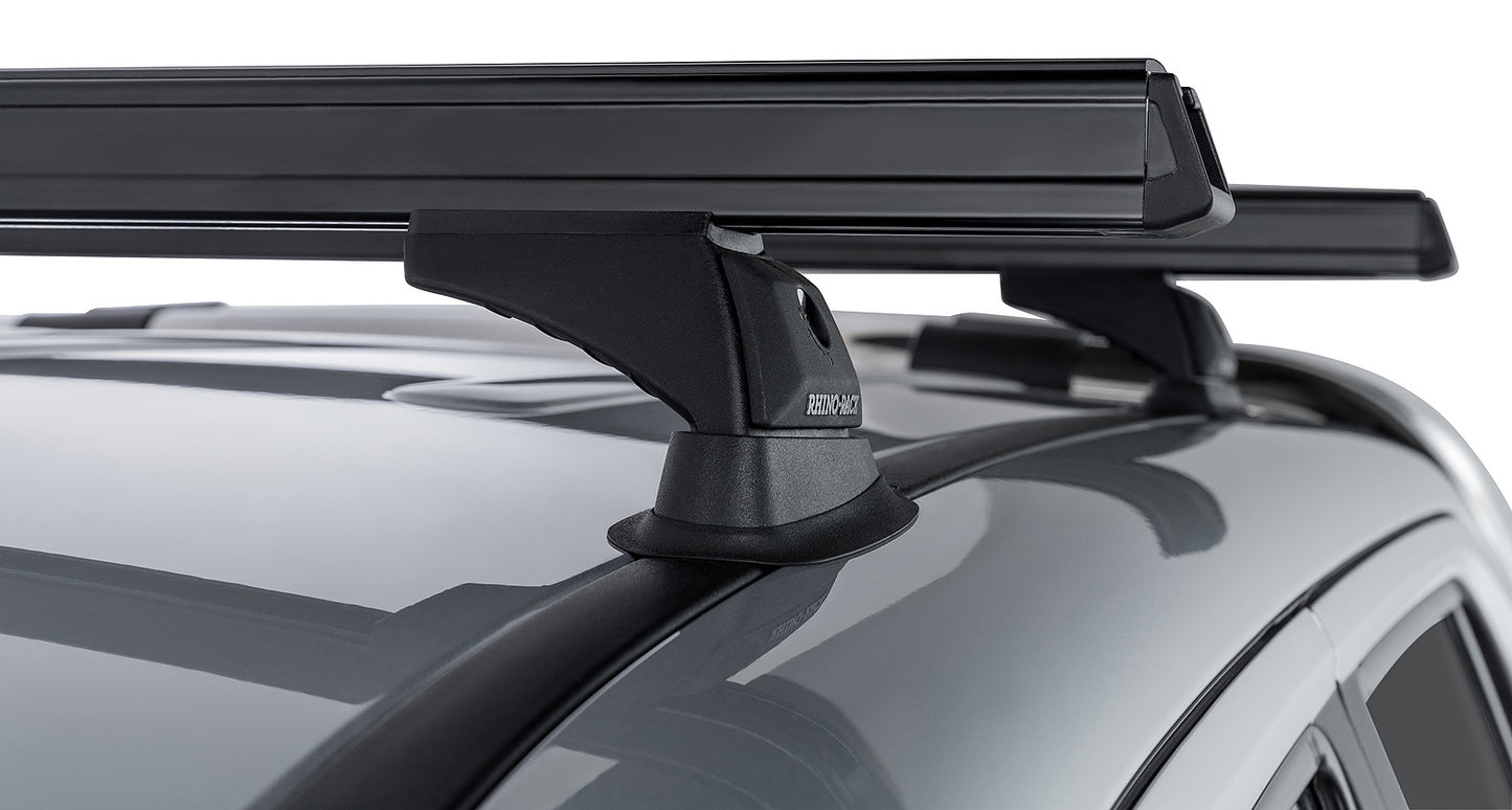 Kit de 2 barres de toit noires Heavy Duty RHINO-RACK pour Volkswagen Amarok 2011-2023, avec pieds de fixation robustes.