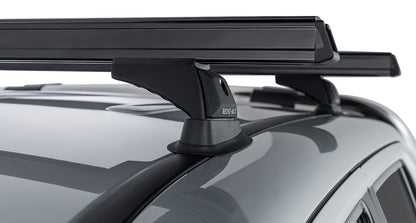 Kit de 2 barres de toit noires Heavy Duty RHINO-RACK pour Volkswagen Amarok 2011-2023, avec pieds de fixation robustes.