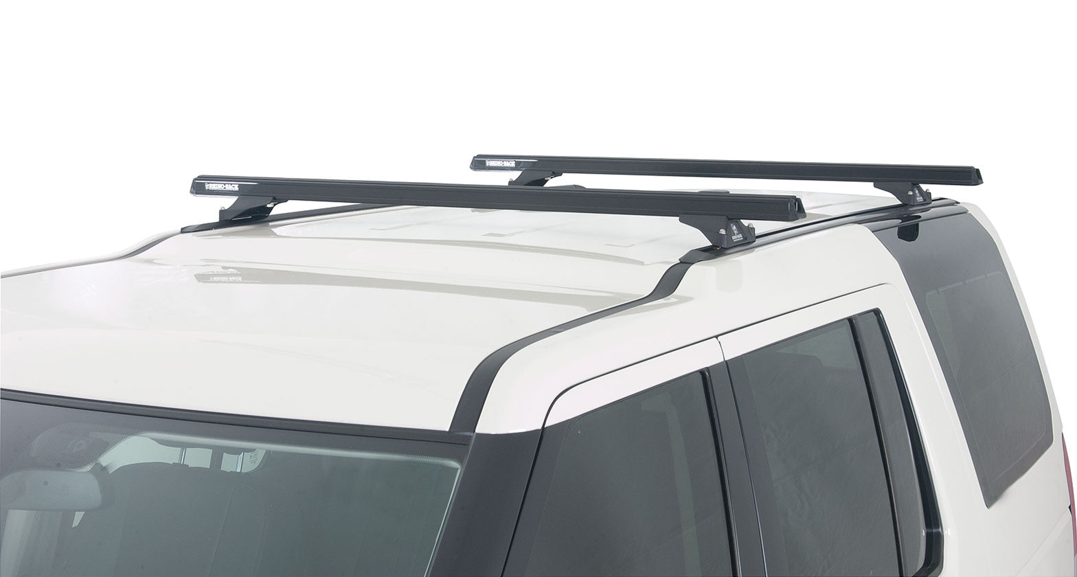 Kit de 2 barres de toit noires RHINO-RACK Heavy Duty pour Land Rover Discovery 3 et 4, 1375mm, fixation Trackmount.