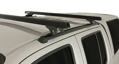 Kit de 2 barres de toit noires Heavy Duty RHINO-RACK pour Nissan Navara D40 2005-2015, fixation Trackmount, 1375 mm.