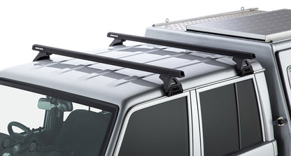 Kit de 2 barres de toit noires RHINO-RACK Heavy Duty 1500mm avec pieds pour Toyota Land Cruiser série 79 2007+