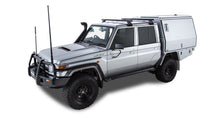 Kit de 2 barres de toit noires Heavy Duty de 1500mm avec pieds pour Toyota Land Cruiser série 79 2007+ de RHINO-RACK.
