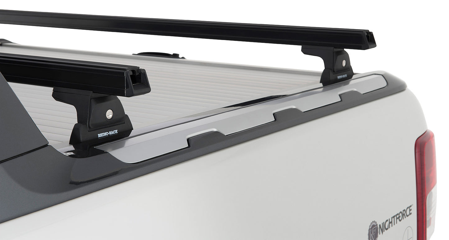 Barres de toit noires Heavy Duty de 1500mm avec pieds RLT600 pour Ford Ranger Wildtrak T6/T7/T8 2012-2022, marque RHINO-RACK.