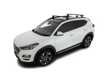 Kit 2 barres de toit Rhino-Rack Sportz 1180mm pour Hyundai Tucson 2016-2021, vue des barres de toit installées sur le véhicule.