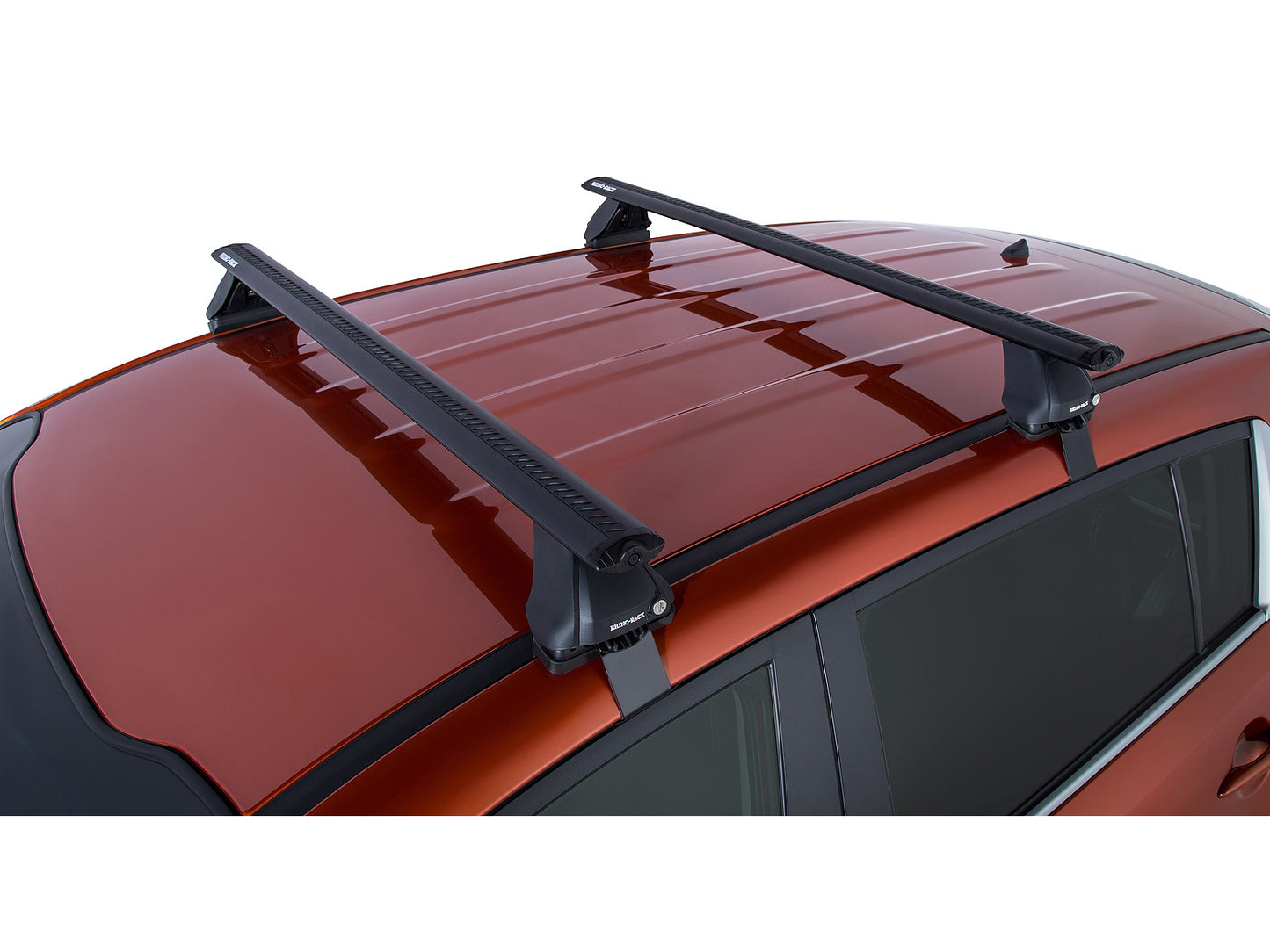 Kit 2 barres de toit Rhino-Rack Sportz 1260mm pour Kia Sportage SL 2010-2015, montées sur le toit du véhicule.