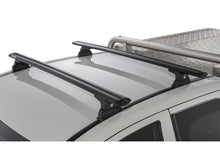 Kit 2 barres de toit Rhino-Rack Sportz 1260mm pour Mitsubishi L200 Double et Extra Cab 2015-2024, vue des barres installées.