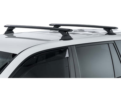 Kit 2 barres de toit RHINO-RACK Sportz de 1260mm pour Nissan X-Trail T31 2007-2014, vue de dessus avec fixation.
