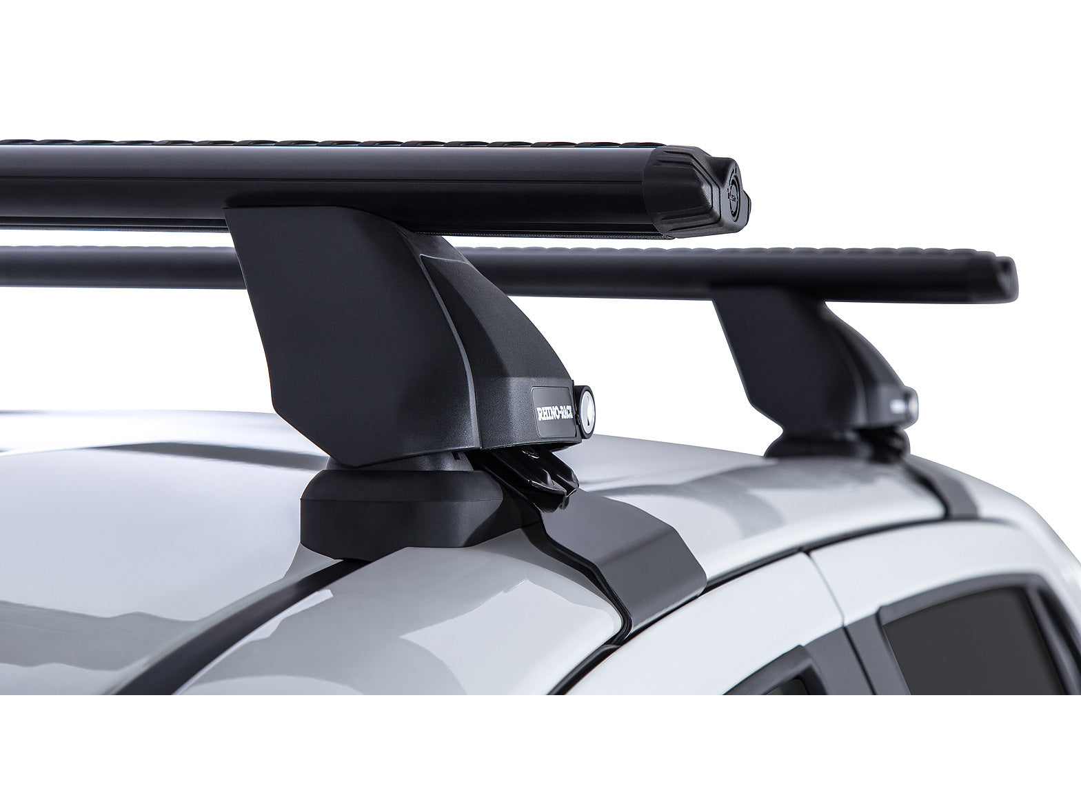 Kit 2 barres de toit Rhino-Rack Sportz 1260mm pour Toyota Hilux Revo Double Cab 2015+, fixation solide et résistante.
