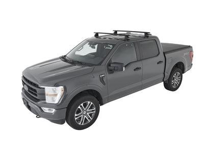 Kit de 2 barres de toit RHINO-RACK Sportz 1500mm pour Ford F150 Super Cab 2015+, montées sur le toit du véhicule.