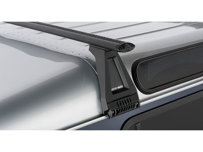 Kit de 2 barres de toit Sportz de 1500mm pour Land Rover Defender 90 110 130, de la marque RHINO-RACK, montées sur le véhicule