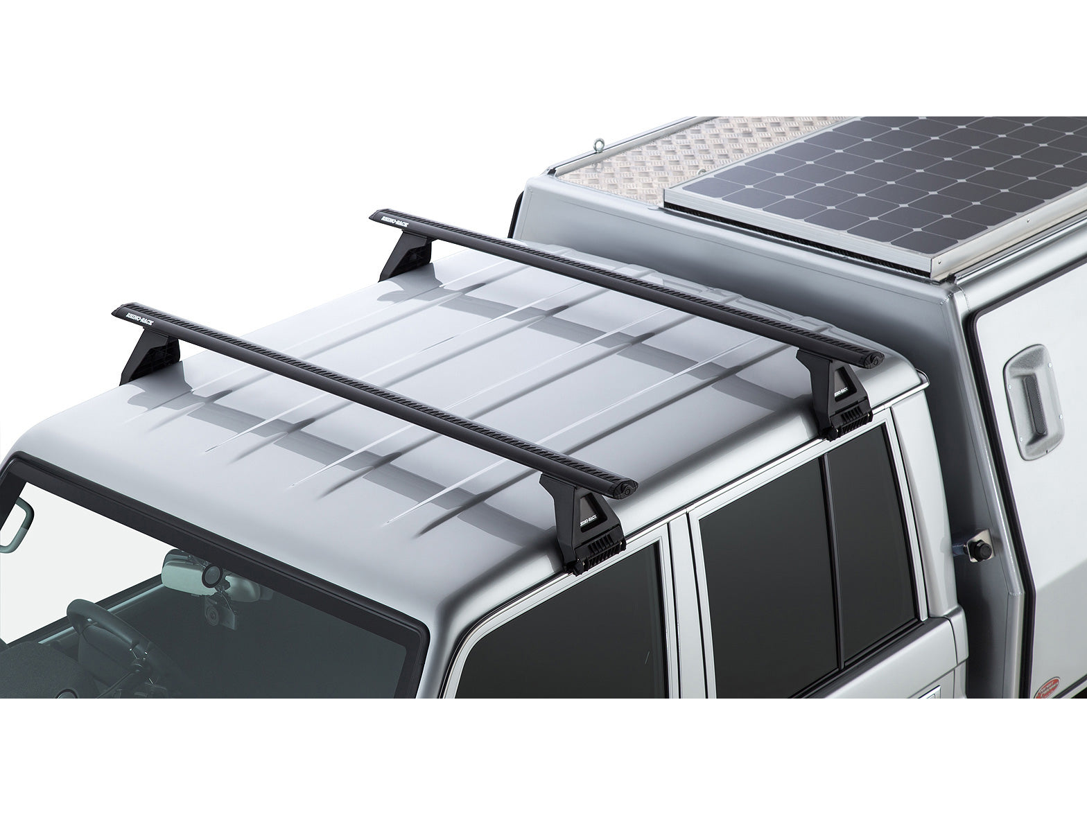 Kit 2 barres de toit RHINO-RACK Sportz 1500mm pour Toyota Land Cruiser HZJ79 GRJ79 double cab, fixation robuste.