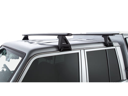 Kit de 2 barres de toit Sportz de 1500 mm pour Toyota Land Cruiser HZJ79 GRJ79 double cab, de la marque RHINO-RACK.