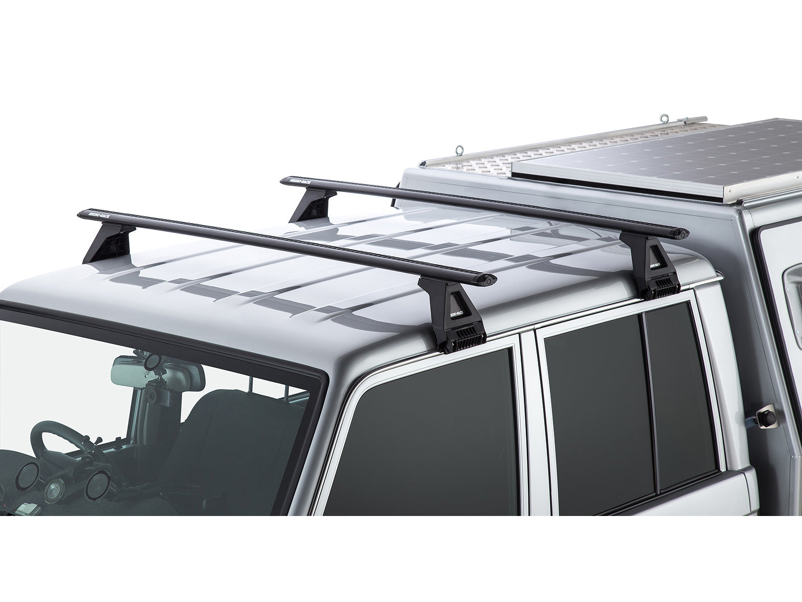 Kit 2 barres de toit Sportz 1500mm pour Toyota Land Cruiser HZJ79 GRJ79 double cab, marque Rhino-Rack, fixation solide et robuste.