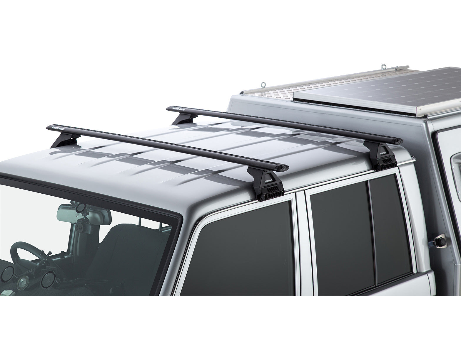 Kit 2 barres de toit Rhino-Rack Sportz 1500mm pour Toyota Land Cruiser HZJ79, double cab, avec fixation robuste.