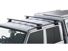 Kit 2 barres de toit Rhino-Rack Sportz 1500mm pour Toyota Land Cruiser HZJ79, double cab, avec fixation robuste.