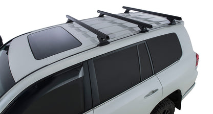 Kit 3 barres de toit noires RHINO-RACK pour Toyota Land Cruiser série 200 2007-2021, avec pieds et fixation robuste.