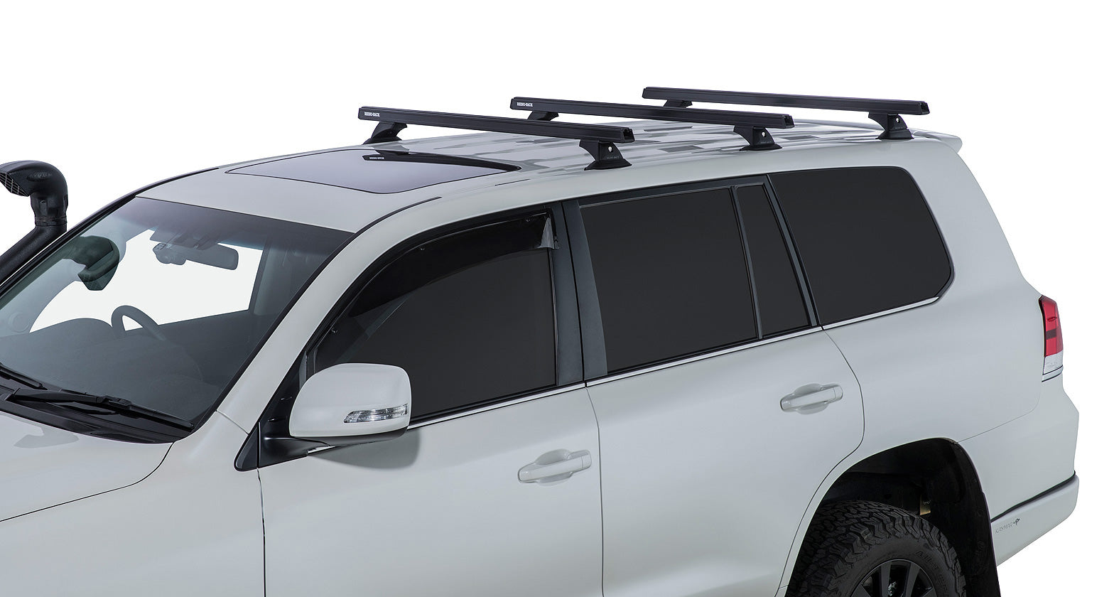 Kit de 3 barres de toit noires RHINO-RACK pour Toyota Land Cruiser série 200, 1375 mm, avec pieds, robuste et pratique.