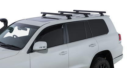 Kit de 3 barres de toit noires RHINO-RACK pour Toyota Land Cruiser série 200, 1375 mm, avec pieds, robuste et pratique.