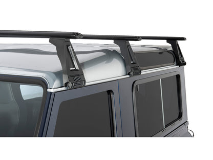 Kit de 3 barres de toit RHINO-RACK Sportz 1500mm pour Land Rover Defender 90, 110, 130, montées sur le toit du véhicule.