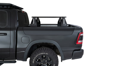 Kit de 4 barres de toit Reconn-Deck RHINO-RACK pour Dodge Ram 1500 Gen V 2019+, barres de benne robustes pour chargement.