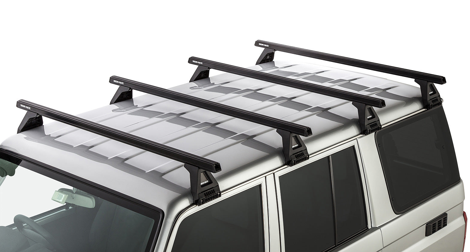 Kit de 4 barres de toit noires Heavy Duty de 1500mm avec pieds pour Toyota Land Cruiser série 76 2007+ de la marque RHINO-RACK.