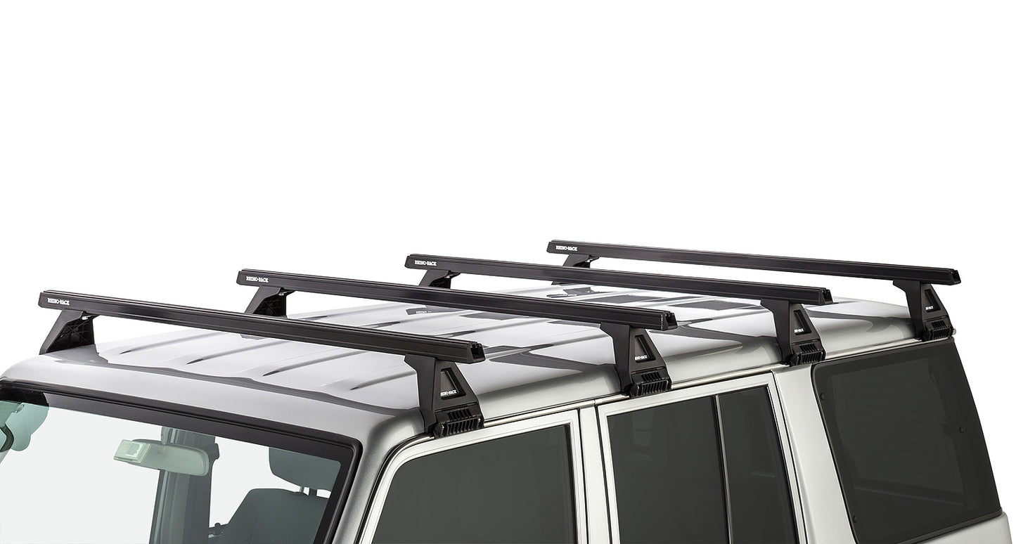 Kit de 4 barres de toit noires Heavy Duty RHINO-RACK pour Toyota Land Cruiser série 76 2007+ avec pieds RL150, longueur 1500mm.