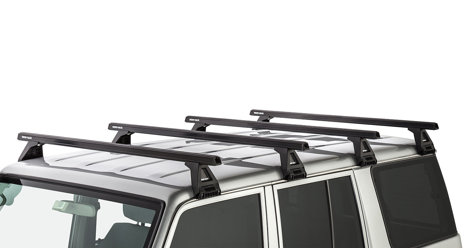 Kit de 4 barres de toit noires Heavy Duty RHINO-RACK pour Toyota Land Cruiser série 76 2007+ avec pieds RL150, longueur 1500mm.