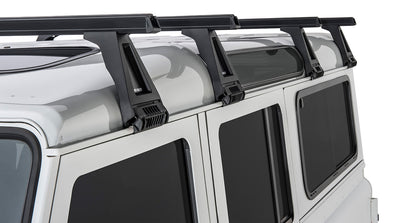 Kit de 4 barres de toit noires Heavy Duty de 1500mm avec pieds pour Land Rover Defender 110 1993-2020, marque RHINO-RACK.