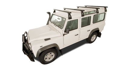 Kit de 4 barres de toit noires Heavy Duty de 1500mm avec pieds pour Land Rover Defender 110 1993-2020, marque RHINO-RACK.