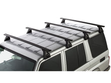 Barres de toit Sportz de 1500mm pour Toyota Land Cruiser HZJ76 GRJ76, kit de 4 barres de la marque RHINO-RACK.