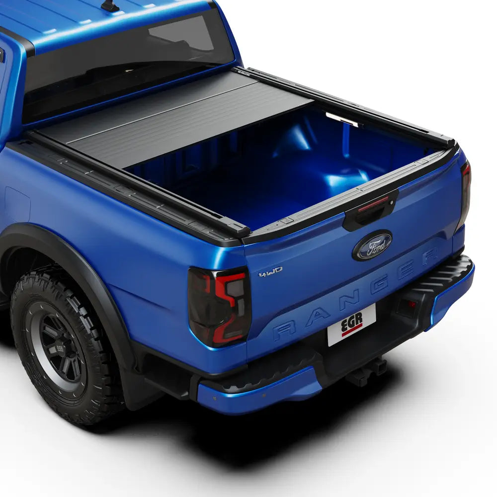 Couvre benne électrique EGR RollTrac pour Ford Ranger/Raptor 2023+ avec panneau PHEV inclus, vue de profil.