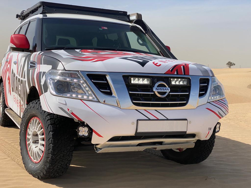 Kit d’éclairage LED LAZER LAMPS pour calandre Nissan Patrol Y62 2018-2022, avec projecteurs LED puissants et design robuste.