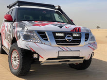 Kit d’éclairage LED LAZER LAMPS pour calandre Nissan Patrol Y62 2018-2022, avec projecteurs LED puissants et design robuste.